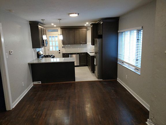 Living room looking into kitchen