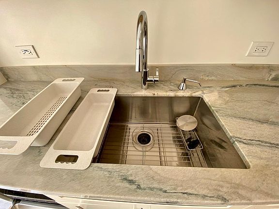 New marble countertops and stainless sink , faucets, etc..