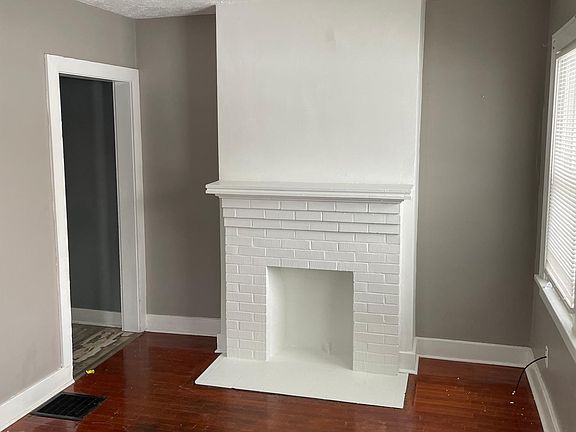 Front living room. Freshly painted fireplace.