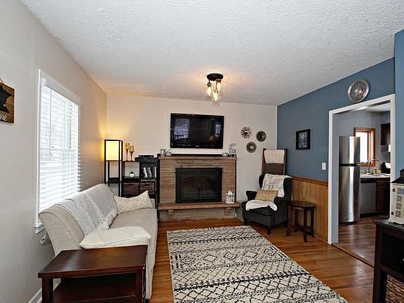 Fabulous living space with gleeming hardwood floprs and updated lighting!