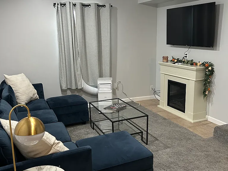 SECTIONAL HAS A DOUBLE RECLINING/OTTOMAN
