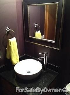 Main Floor Bath
						:
						Granite countertop and all new sink and fixtures.