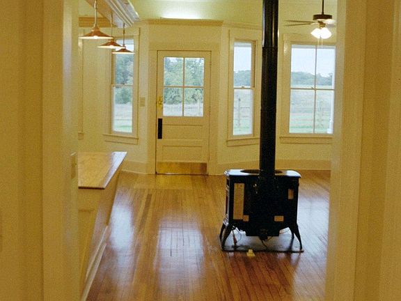 Looking out from the rear hallway towards the farm through the front glass.