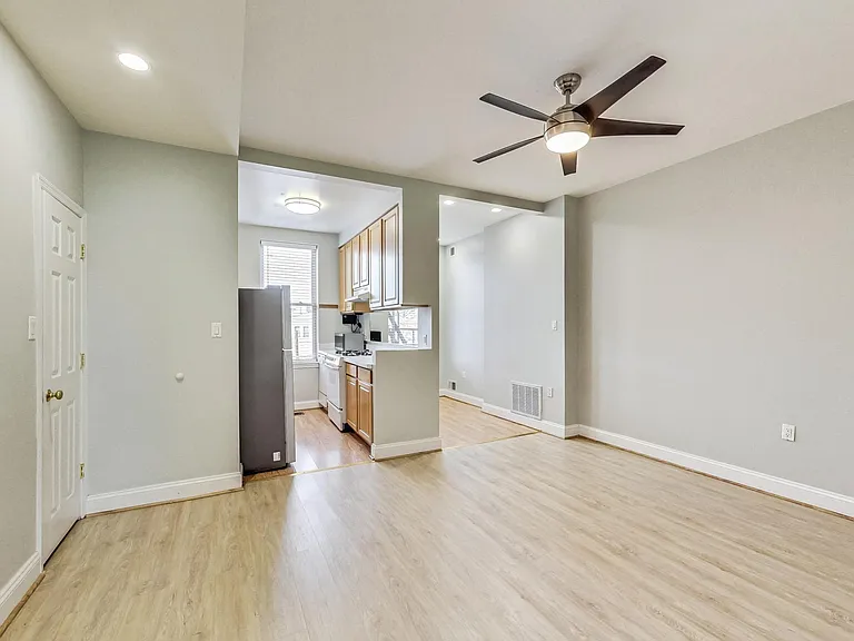 Living room into kitchen and dining room