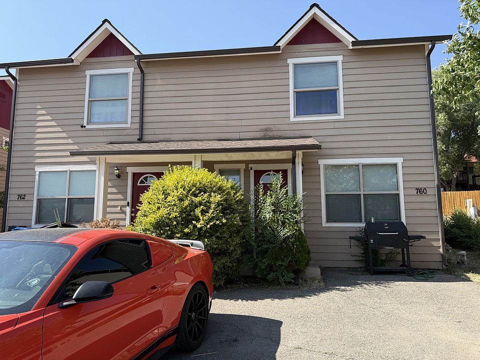 Front of apartment building
760 is on the right with a side right with a side yard