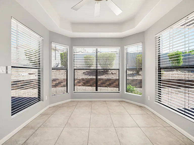 Eat in the kitchen dining area with 180-degree windows to the backyard.