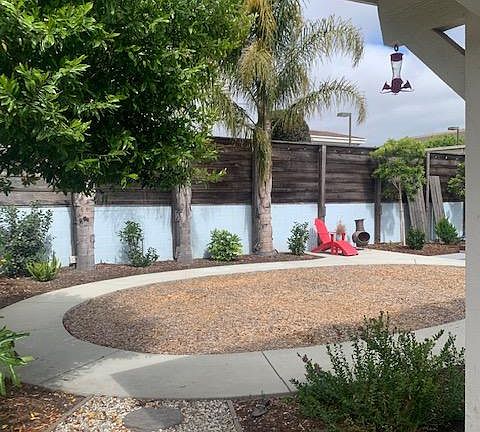 Photo taken from side yard. Lots of possibilities for the middle area.
