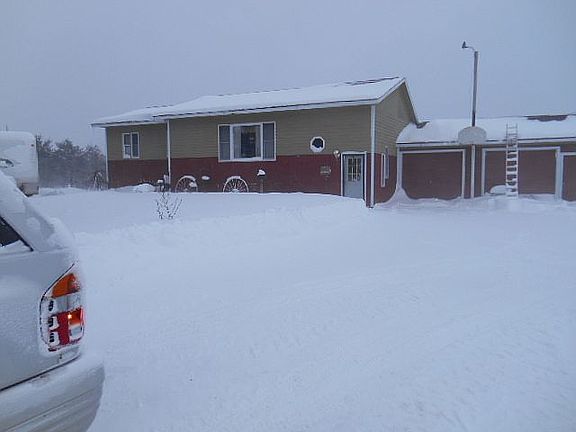 front of house in the winter