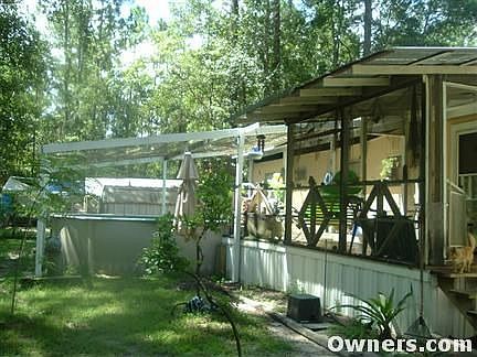 shaded yard with pool