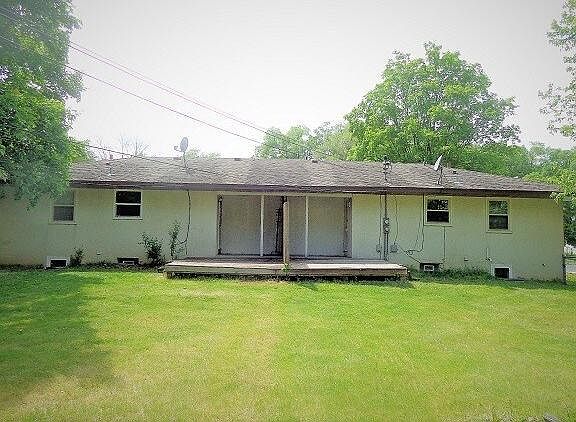 Back of duplex in backyard (9127 on left)