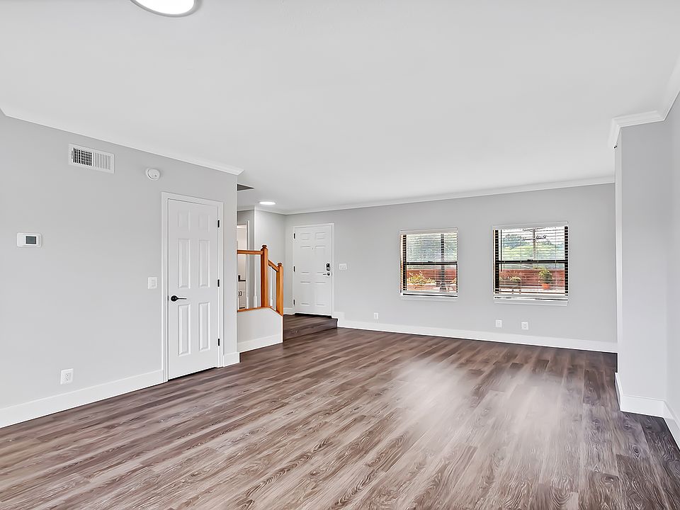 Select homes have upgraded kitchens/baths with wood flooring throughout