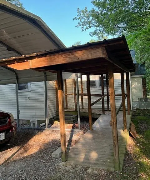 Back entrance with accessibility ramp