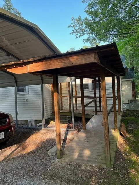 Back entrance with accessibility ramp - 729 Westside Dr