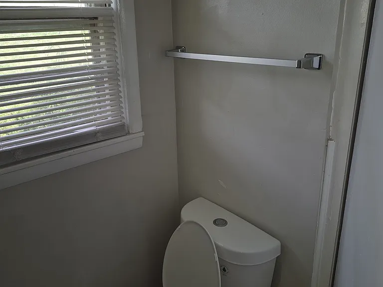 Toilet in bedroom bathroom
