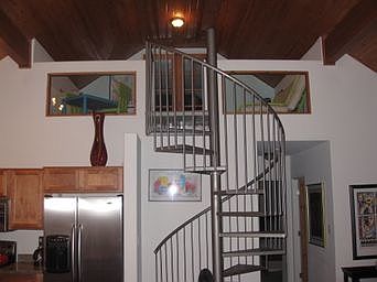 Stairs up to the loft and 3rd bedroom