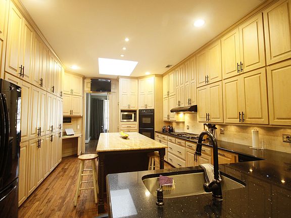 Massive updated kitchen. Includes gas range and double oven.