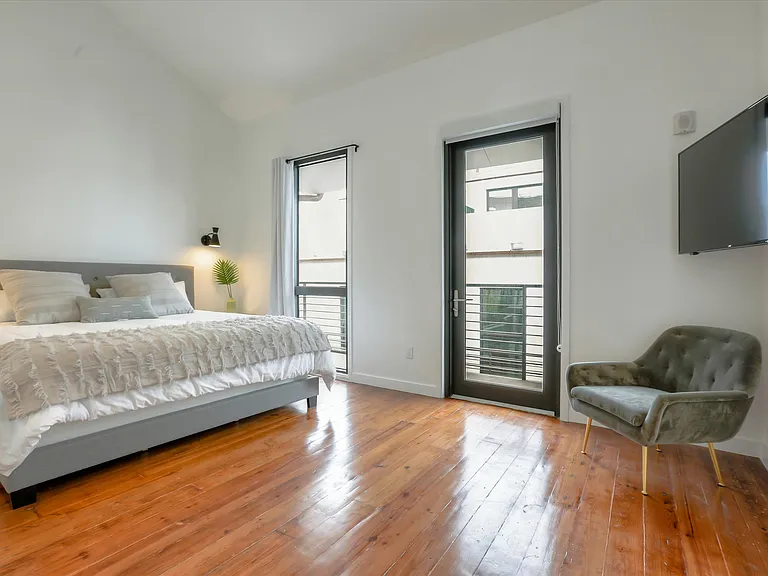 The Smart TV in the master bedroom has apps including Netflix and Hulu so that guests can easily login through their personal accounts.