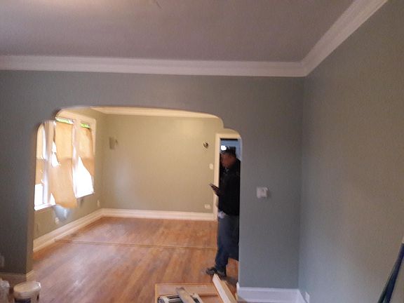 Standing in the Living room looking into the dining room. Large seperate rooms. All rooms are hardwood floor. Very sunny 1st floor flat.