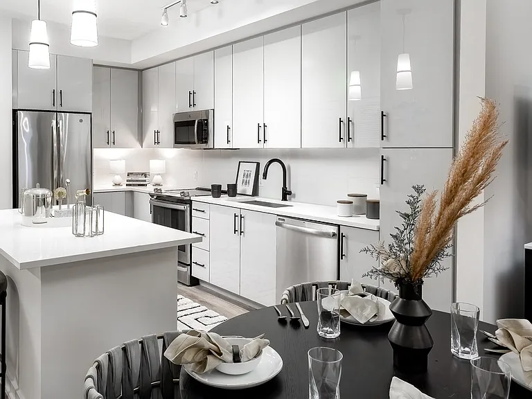 Glass cooktops and French door refrigerators complete our chef inspired kitchens.