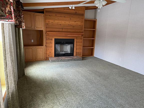 Decorative fireplace (Not a working fireplace) with bookshelves in Living Room (1)