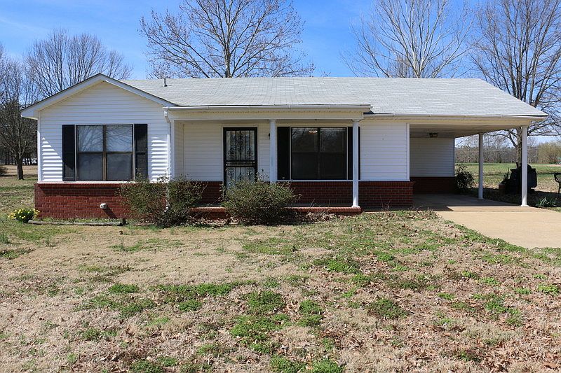 Covered front porch and carport