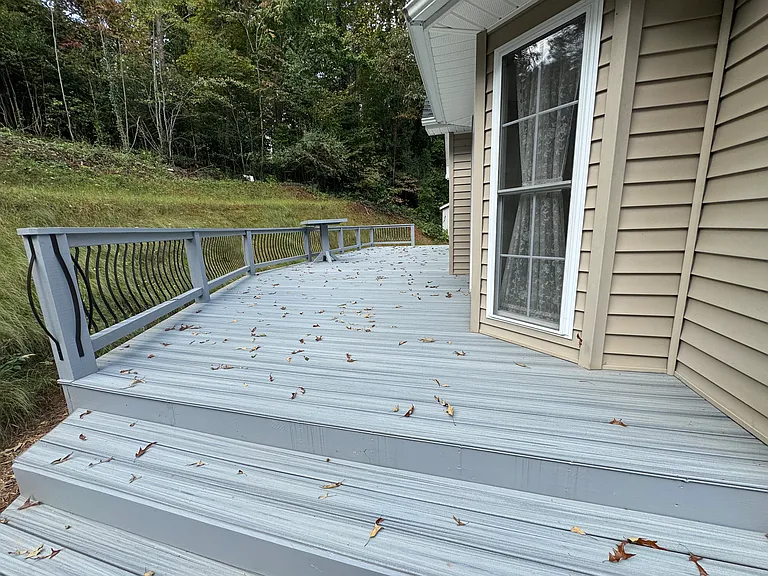 Bigger new deck. Old deck photo in group of photos.
