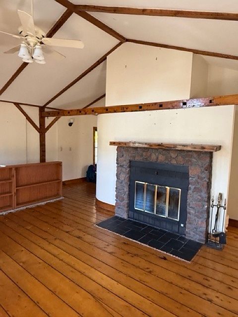 Living room with working fireplace, remote control ceiling fan