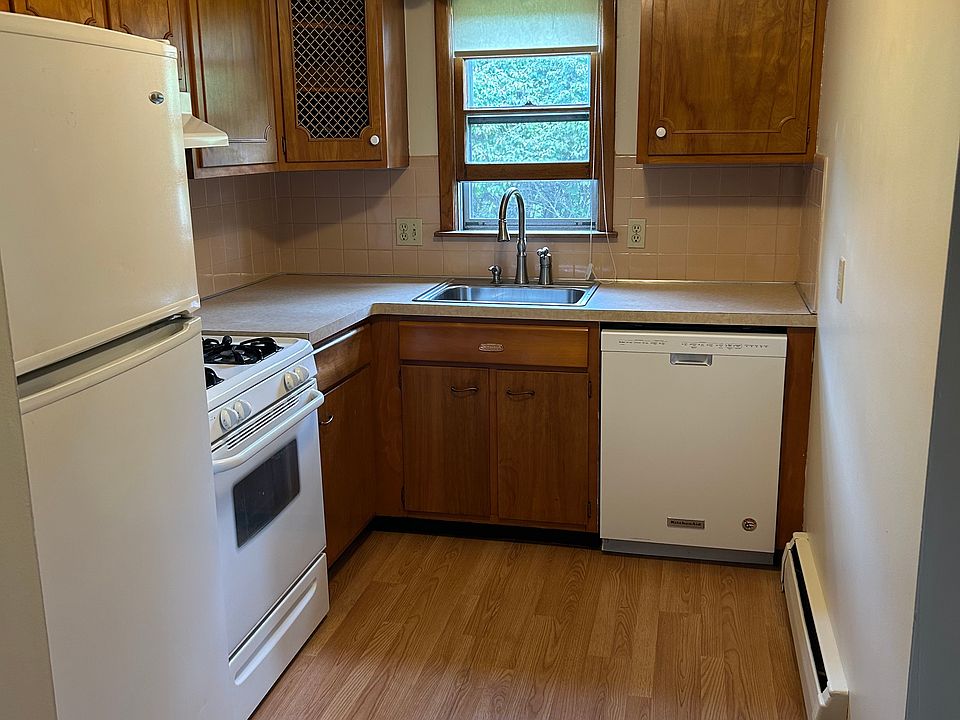 Complete Kitchen - showing dish washer - small table and chairs fit