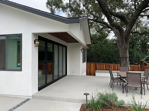 Front Entrance on South Side - 15-Foot Bi-Folding Door and 8 Foot Door Height Optimizes Indoor/Outdoor living