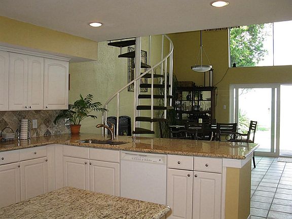 Wide open floor plan from kitchen to dining and living room