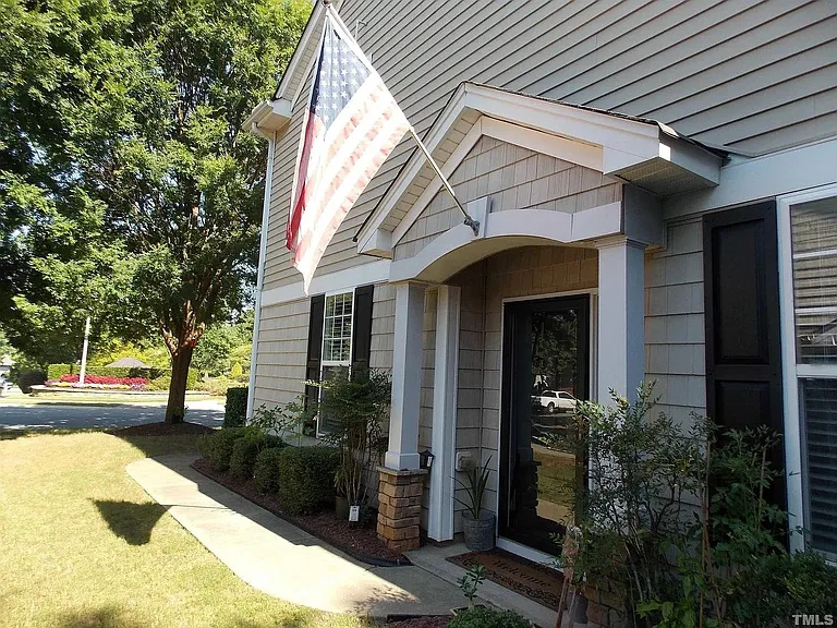 Main entrance to the house is on the side