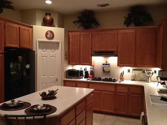 Kitchen with large center island and pantry
