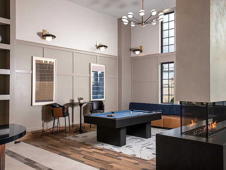 Relax and enjoy leisure time in this upscale recreation room, perfect for entertainment.