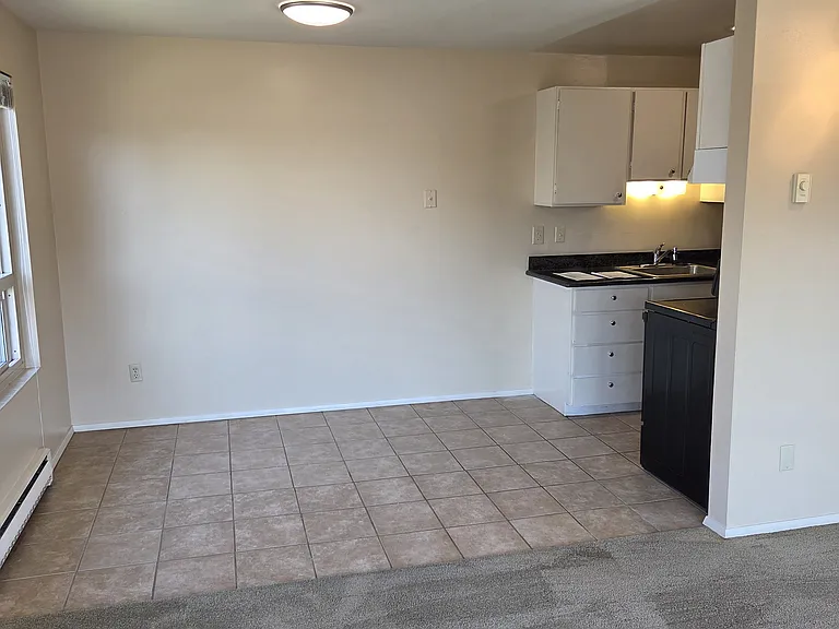 Living room with view towards dining area