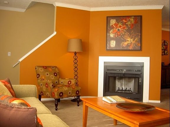 Living room with wood burning fireplace