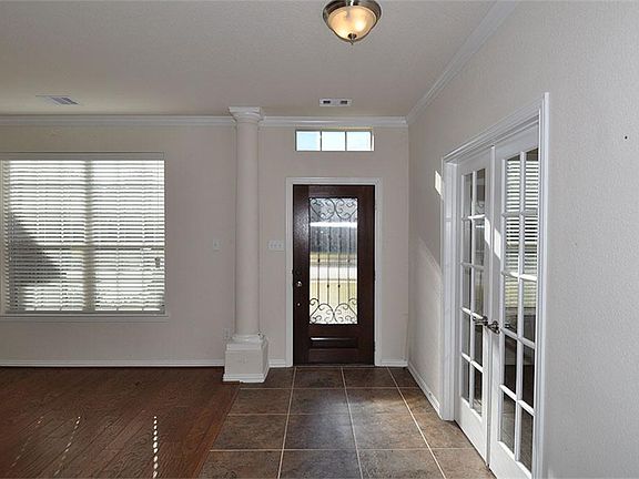 Entry foyer with tiel floor...