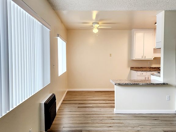 Living room view of dining area.