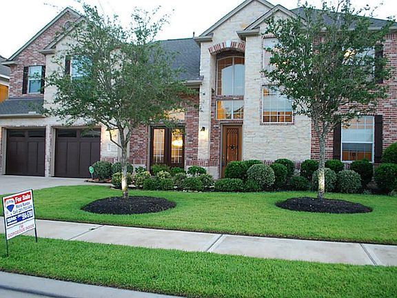 Stone and Brick makes the perfect match for this immaculate home