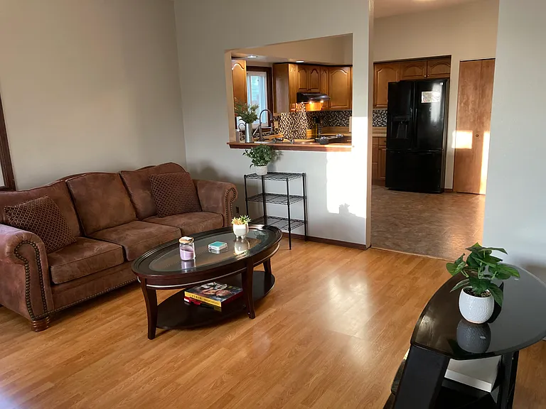 Shared living room leading into kitchen.