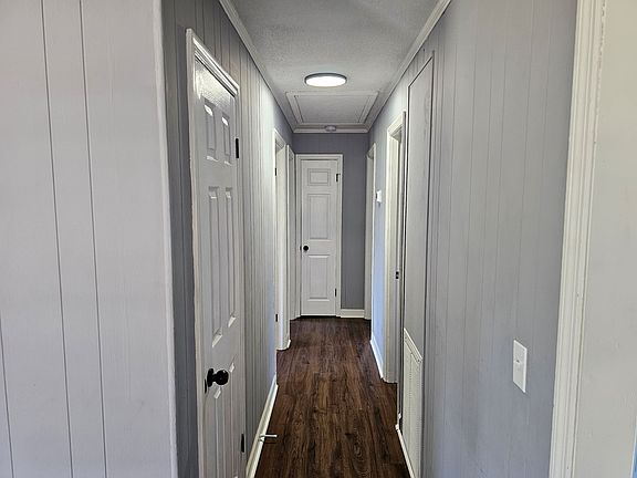 Hallway with Linen Closet and Hall Closet