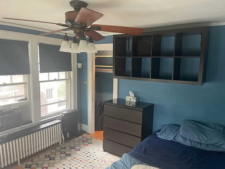 2nd Floor - south east bedroom overlooks roof deck; lighted ceiling fan, personal AC and extra storage