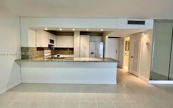 5th image of 6450 Collins Ave APT 1106