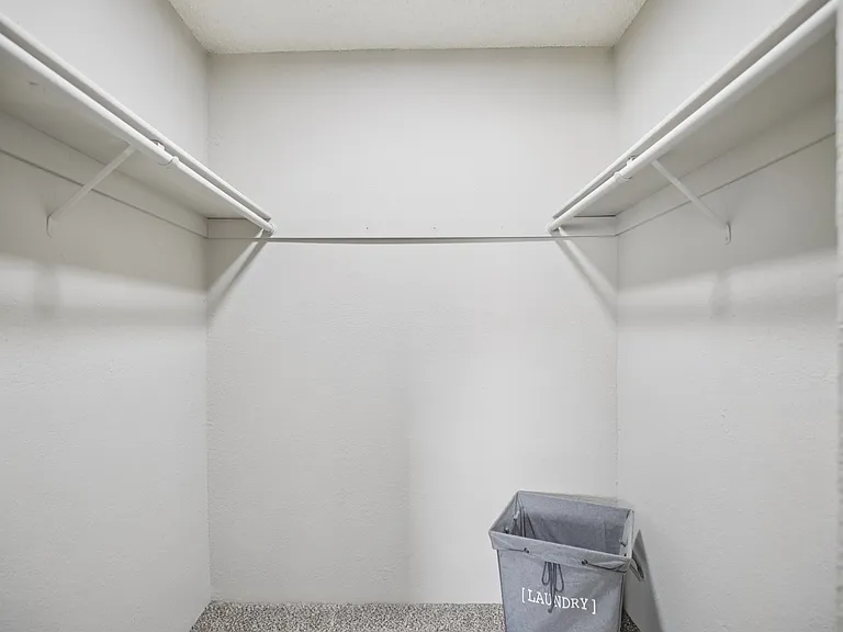 Walk-in bedroom closet.