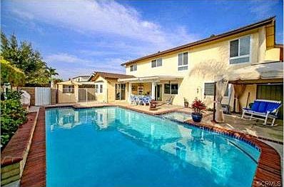 Entertainers backyard with several seating areas