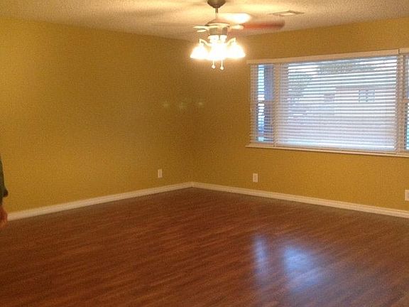 Family room with wood floors.