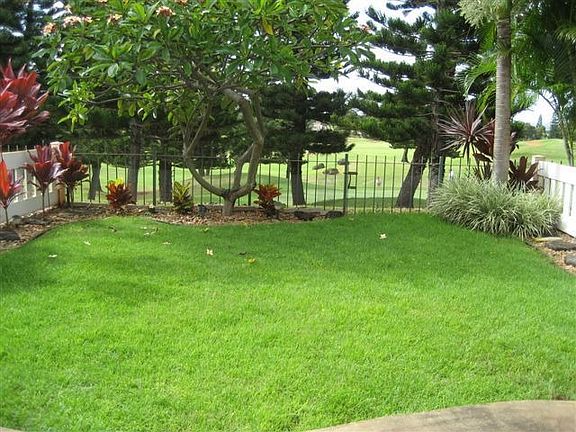 Entertain in your private landscaped yard that has an extended lanai for BBQs.