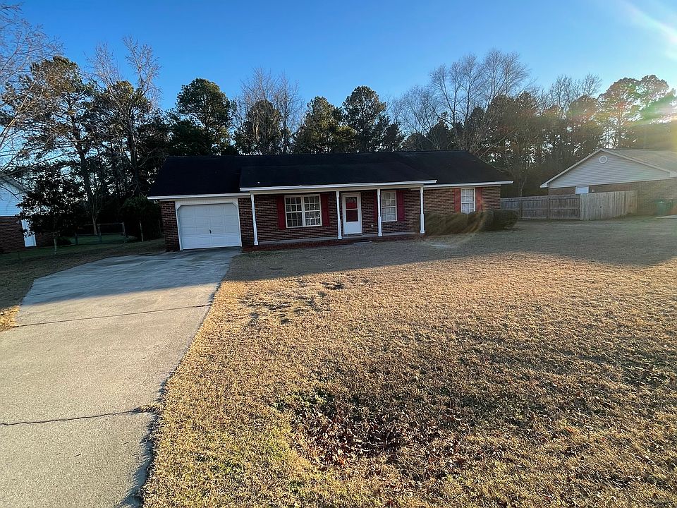 Enjoy a peaceful, and inviting, spacious front yard