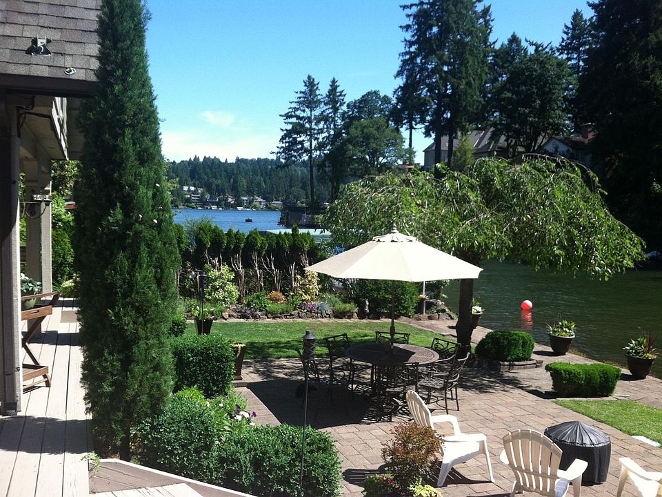 Main lake in the distance, yard as well as patio