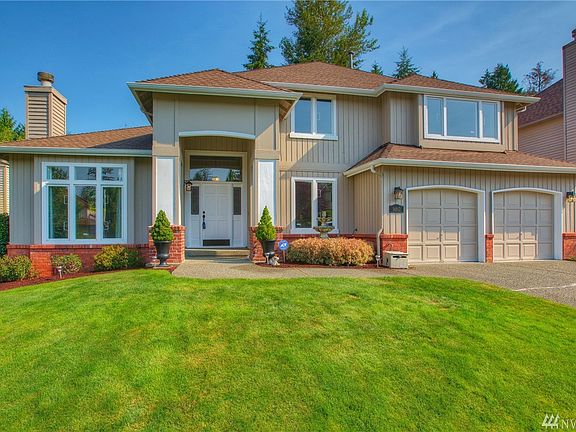 Another View Up Close.  You will love the Fountain outside the office window.  Newer Roof and Ready for you to move in.