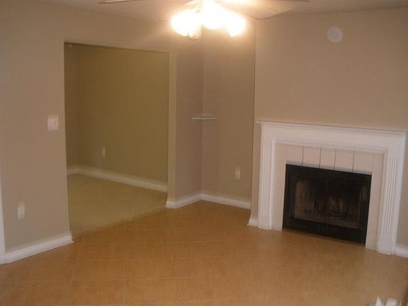 living room, eat in kitchen, fireplace , all tiled